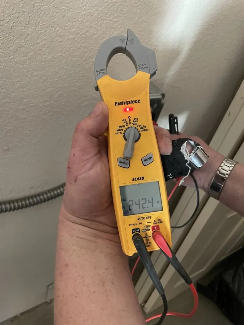Voltage testing with clamp meter during Aluminum Wiring Replacement in Lake Charles